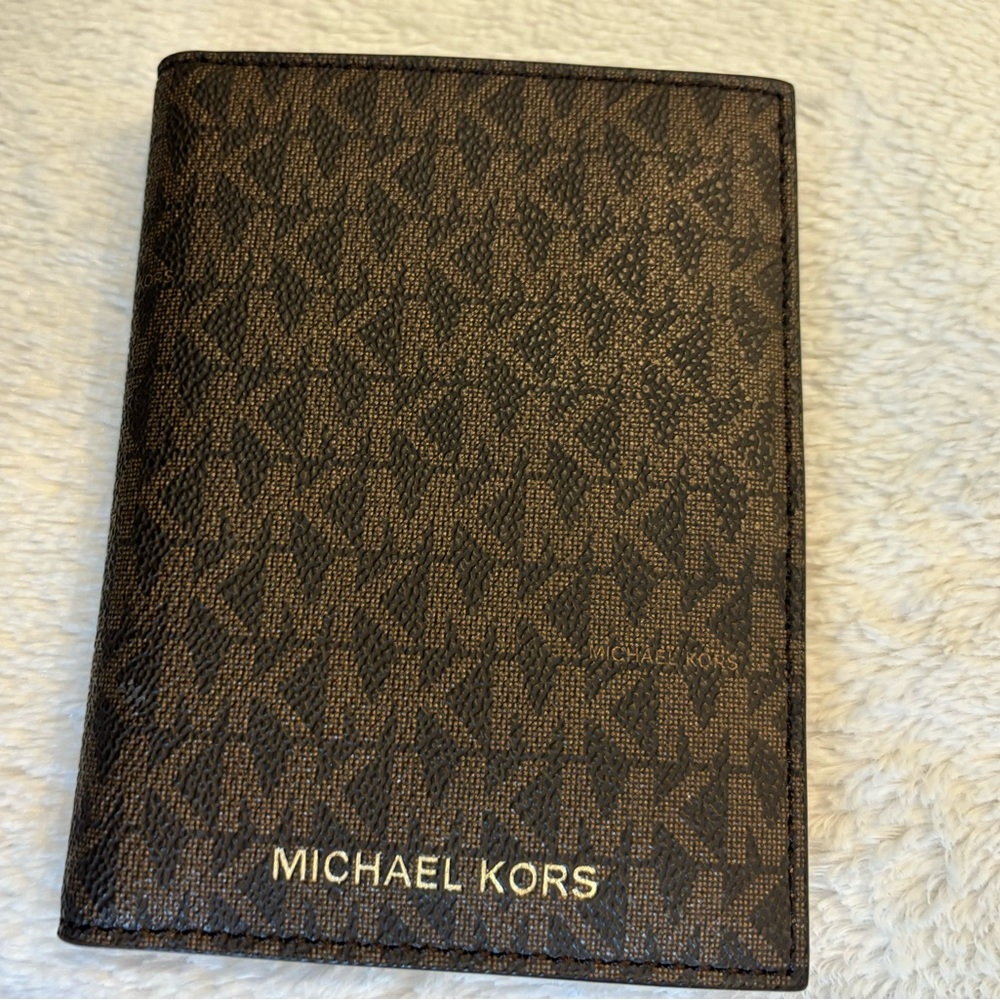 MK Jet set travel passport wallet med used twice like new firm price